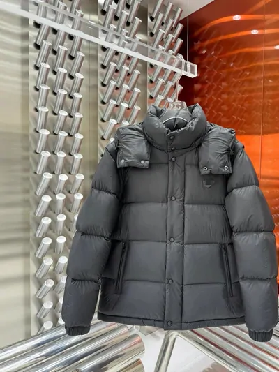 Grey quilted puffer jacket on a boutique display rail
